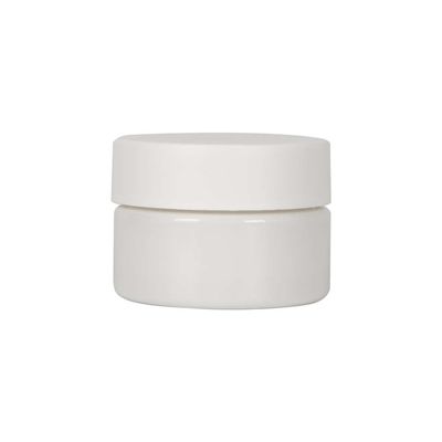 Un pot en plastique PET de 2 oz avec un capuchon anti-enfants
